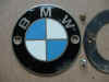 This is one of the /5 emblems with the screws and gasket.  It is 7 cm.  in diameter.  