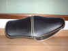 This is the medium seat most often provided on a new slash 2 BMW motorcycle. It cost extra, as the base price was for a solo seat.