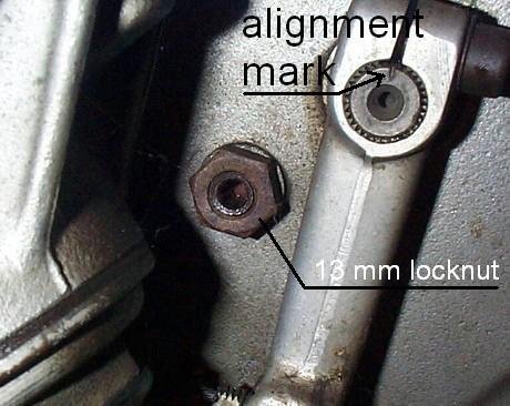 This photo shows a close up of the slash 5 BMW motorcycle front brake backing plate. The important adjustments are shown.