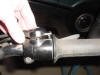 With the cover lifted slightly, the bevel gears can be adjusted.