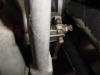 This shows the BMW clutch adjustment bolt. One may back it out a bit to get the cable on or off.