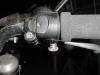 In the center of the photo is the adjuster bolt and spring for the simple cruise control.