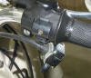 The switch has been removed to show the adapter for mounting the slash BMW 2 turn signal switch.