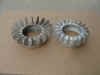 On the left is a slash 5 BMW motorcycle exhaust system nut with the longer rounded fins.  This is the later one without the holes for the pin wrench.  On the right is the late 70's type, also shown in the photo above.  The one on the right has just been glass blasted and the one on the left has not.  