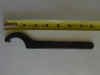 The "Matra" tool that BMW provided to motorcycle dealers.  The curve is correct, unlike the one in the tool kit, but it still applies all pressure to one hole.  That is what can rip out the hole.  