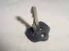 The slash 7 BMW motorcycle key is in the folded position